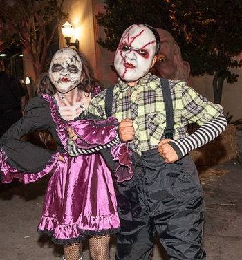 male and female wearing halloween costume