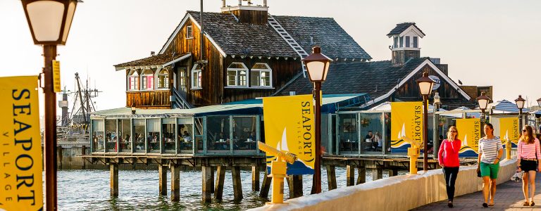 three woman walking at seaport village