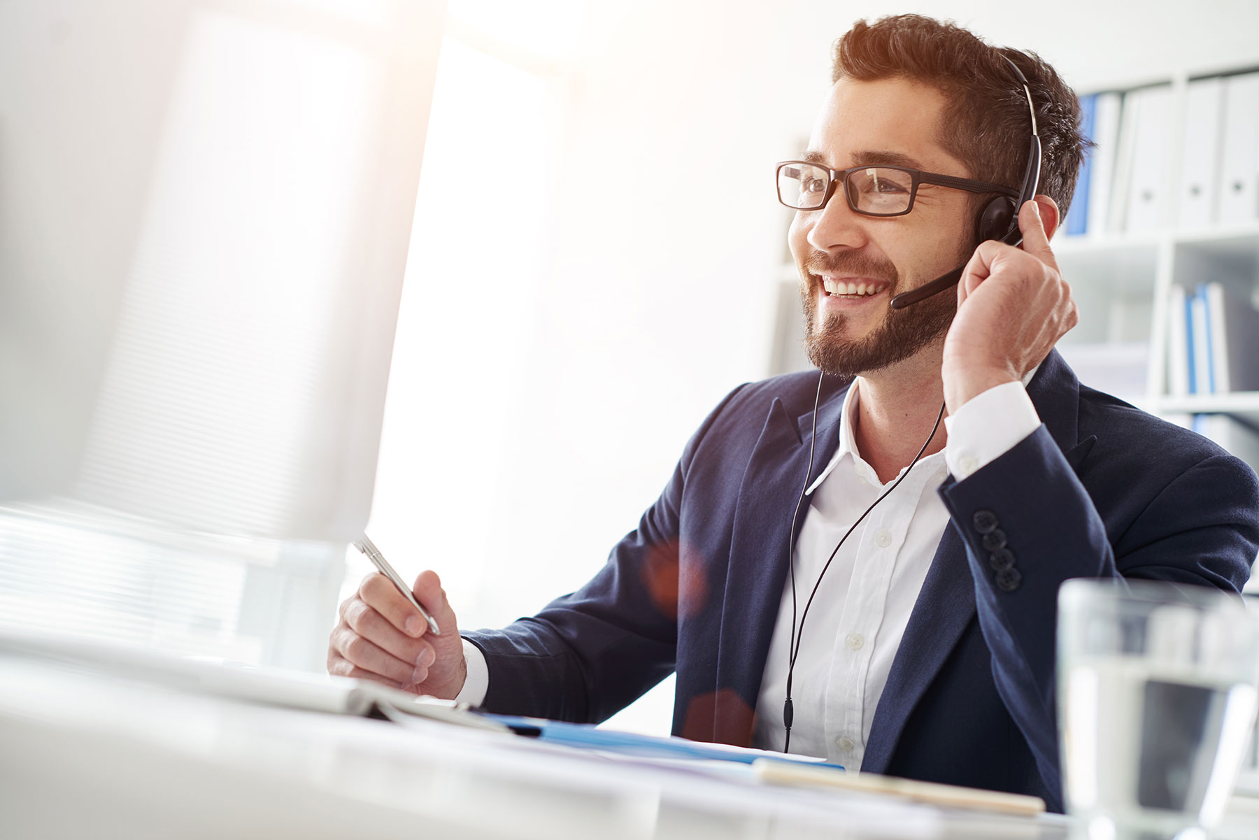 man wearing headphone talking with customer