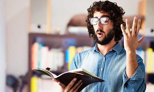 a man reading his script lines