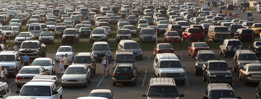 crowded car park parking lot with automobiles