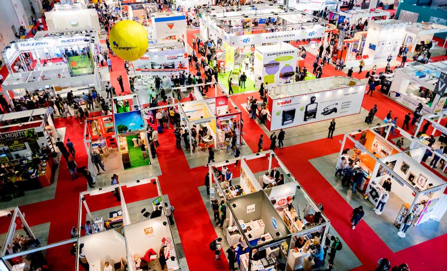 crowds of people on trade show displays