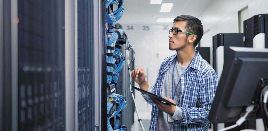 a man checking on network cables