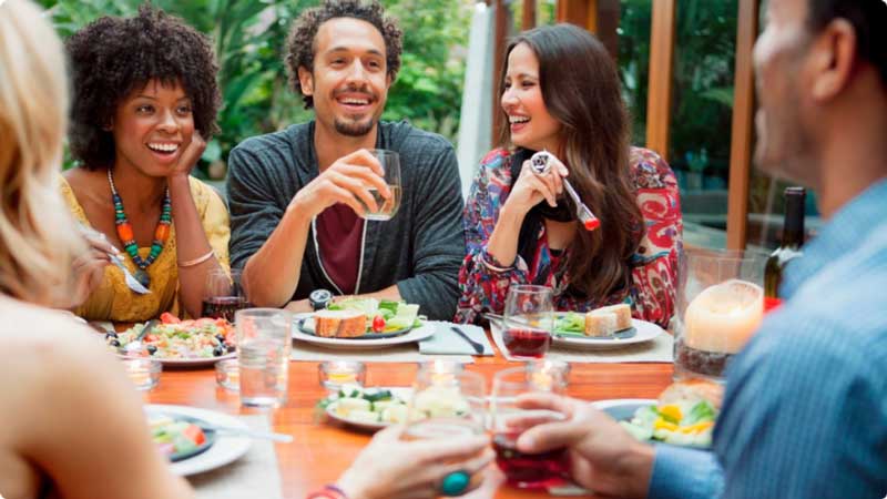 gathering of a group of people that eating and talking