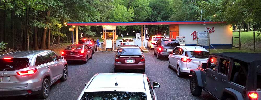 cars-waiting-to-get-into-a-venue-outdoors